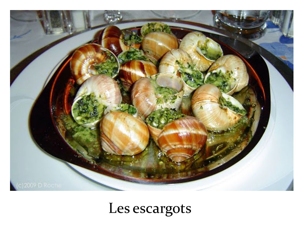 Блюдо из улиток. Эскарго де Бургонь. Улитки Эскарго де Бургонь. Эскарго по бургундски. Эскарго (escargots de Bourgogne).